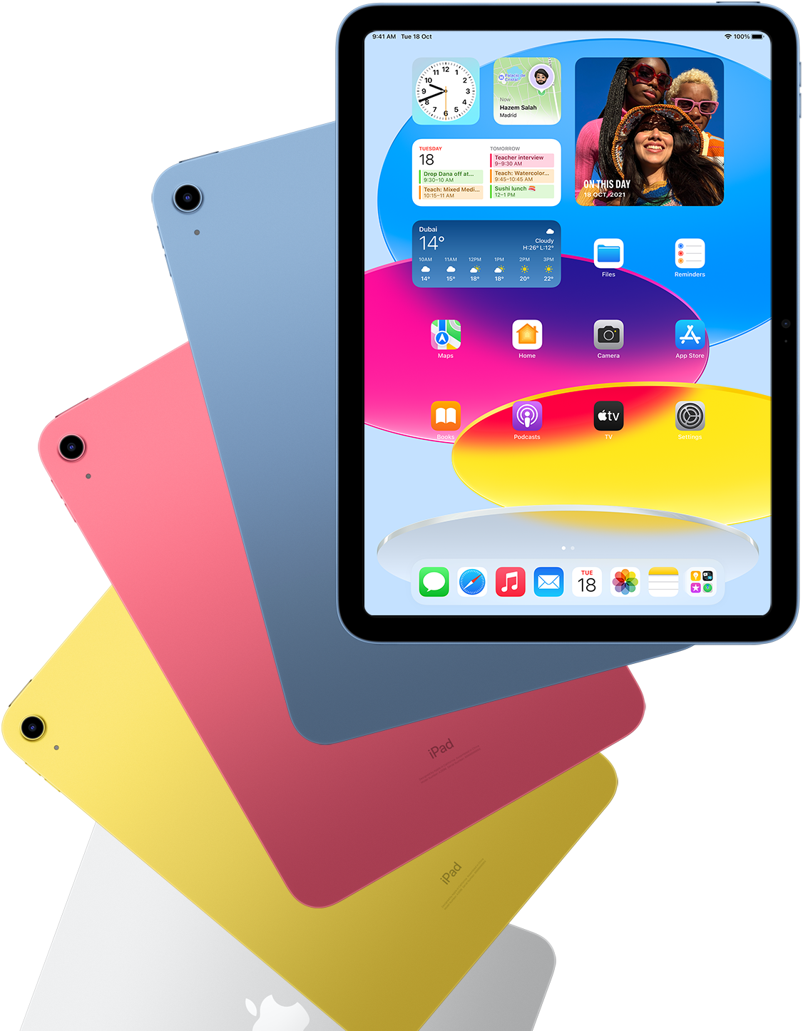 Front view iPad shows home screen with blue, pink, yellow, and silver rear facing iPads behind it.